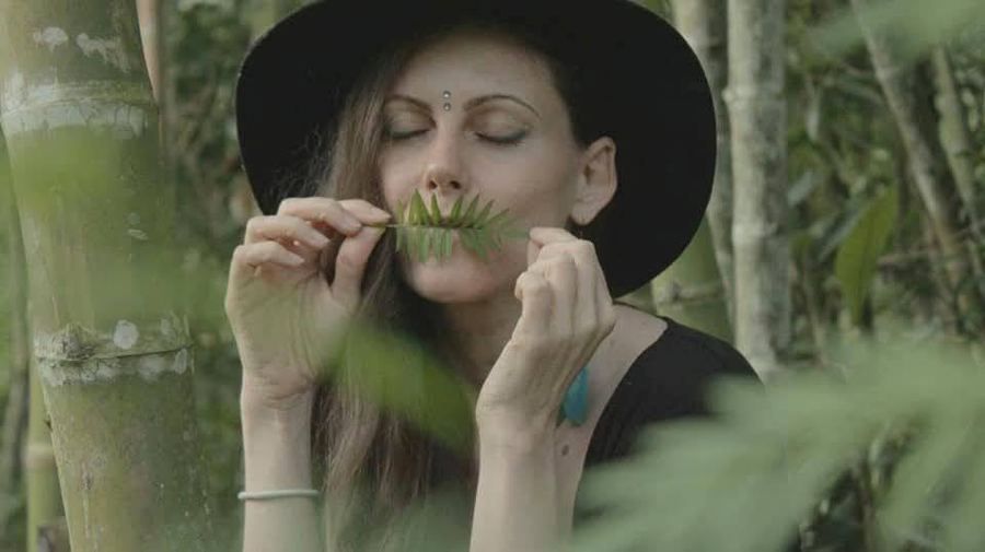 Michela in the forest — her Elven ears visible