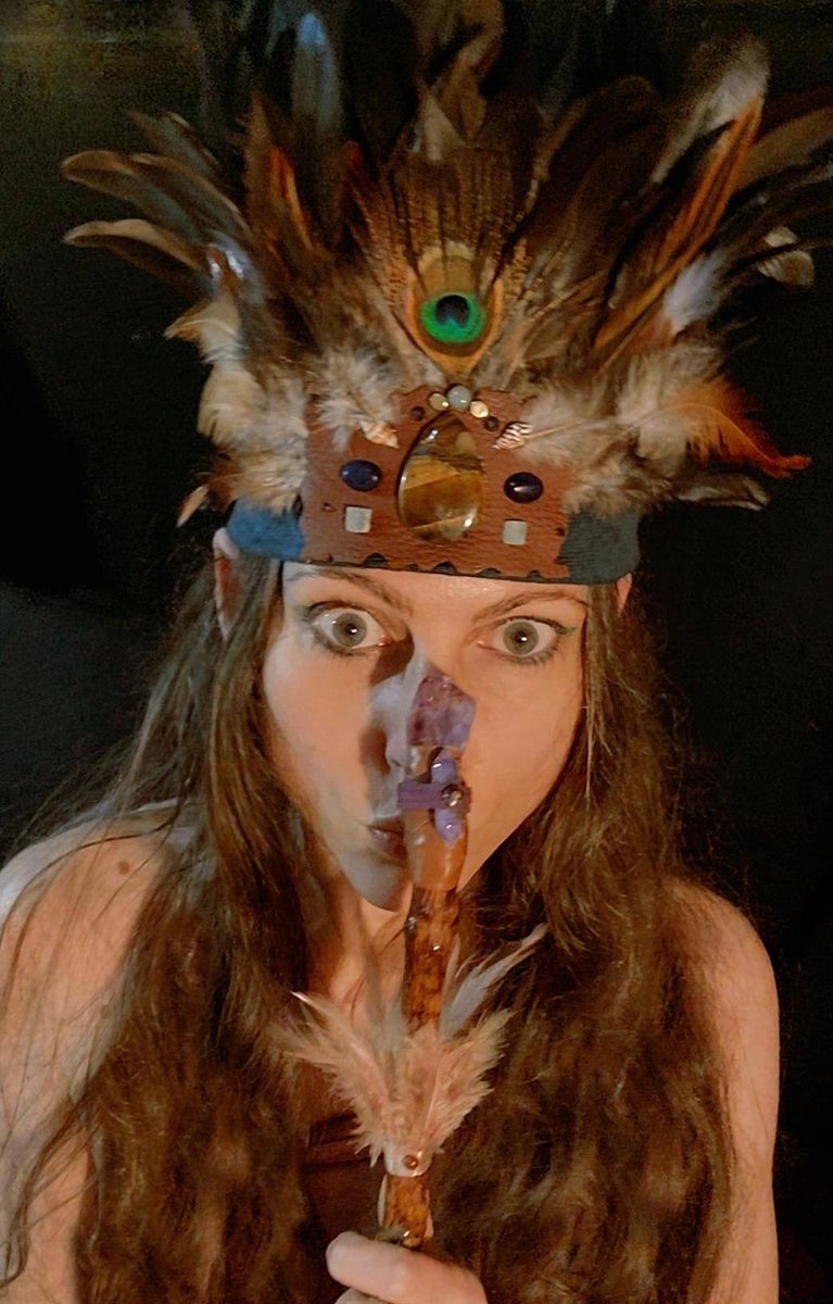 Michela with headdress and wand