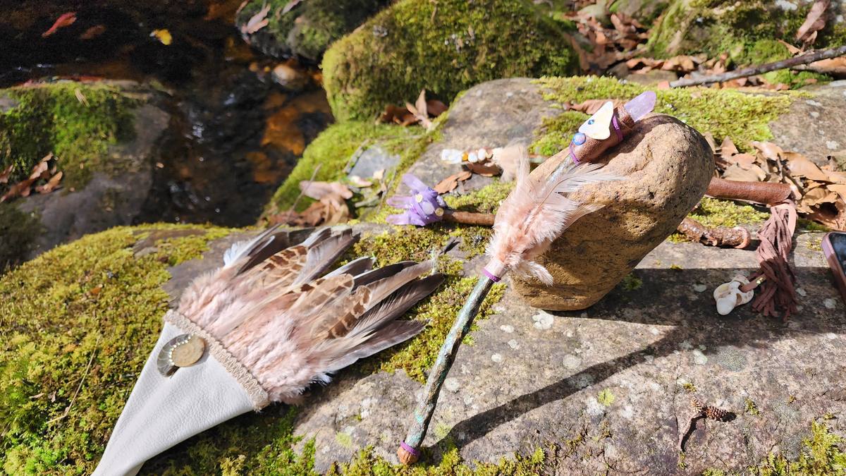 Sacred wands on moss