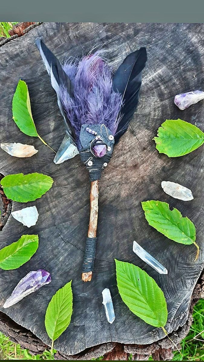 Dark purple wand with crystals