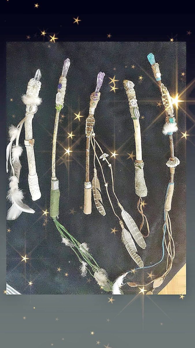 Four wands with stars